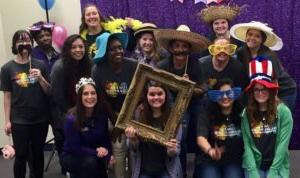 HSU student group photo posed with various costume accessories